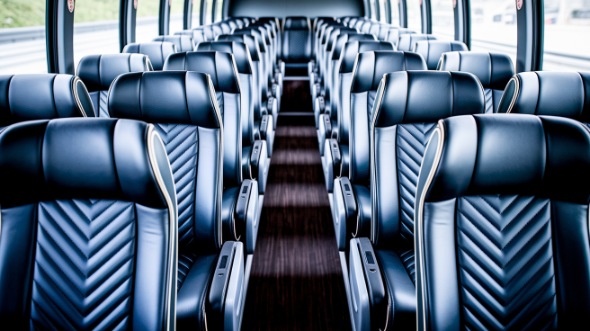 reading 50 passenger charter bus inside