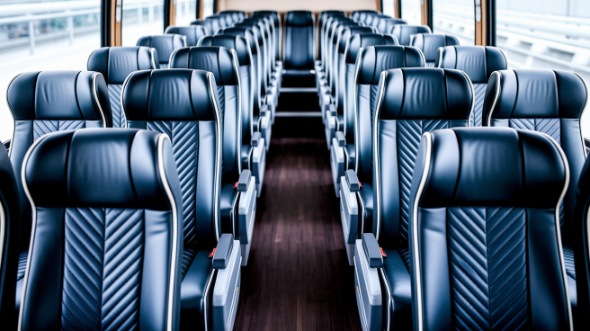 reading 54 passenger charter bus inside