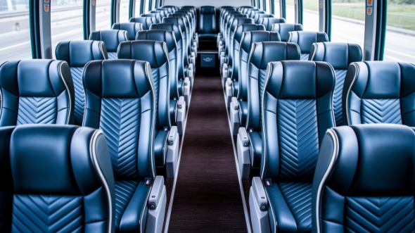 reading 56 passenger charter bus inside
